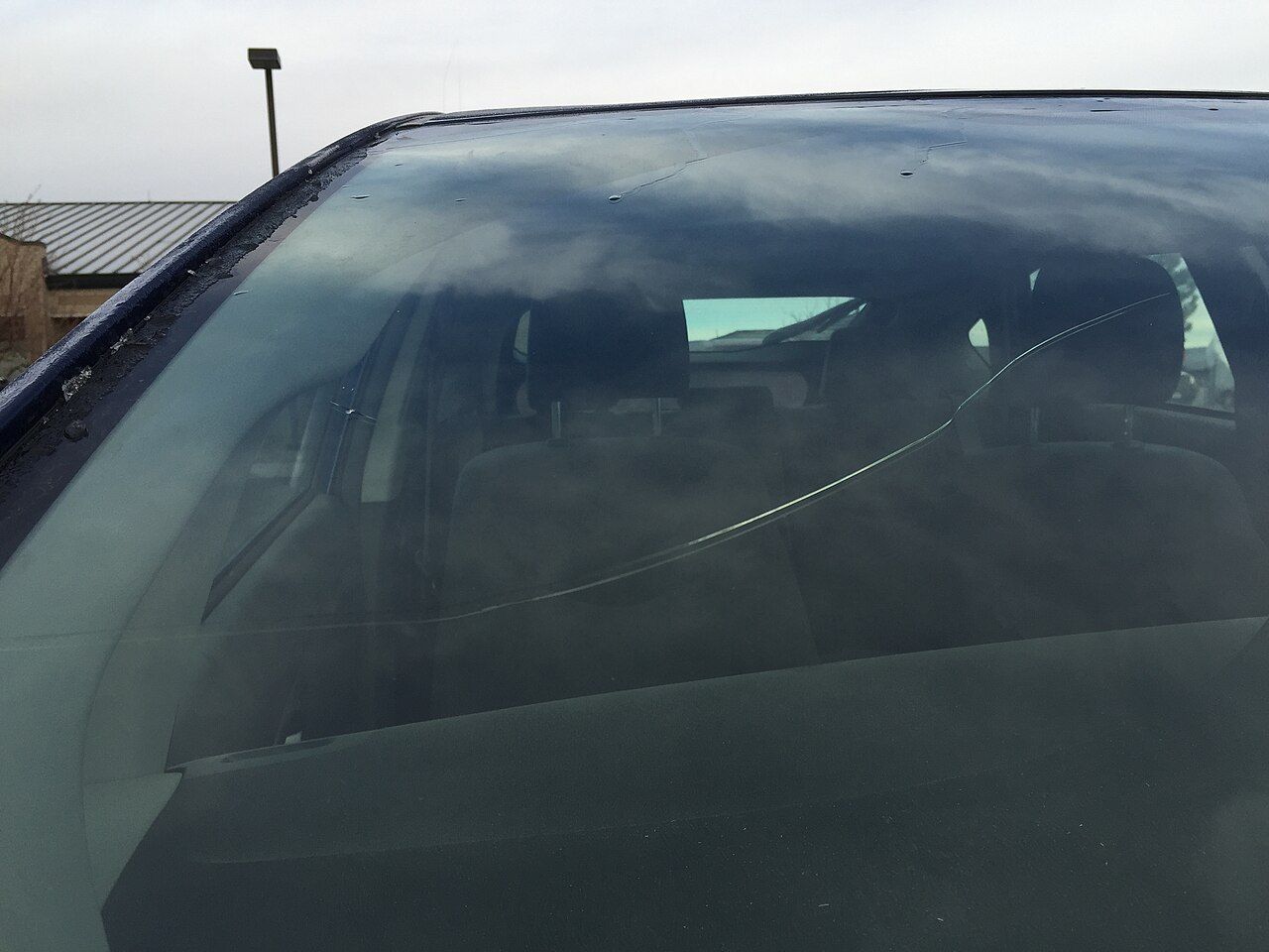 A crack across a car windshield