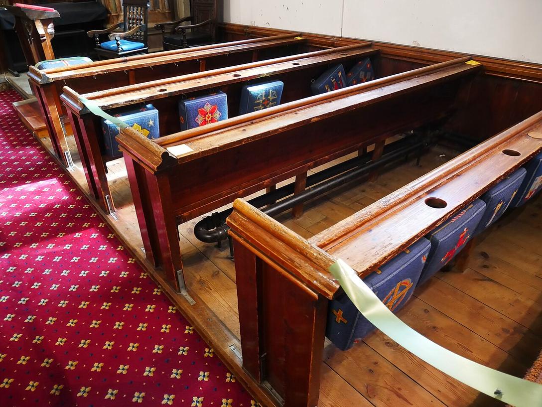 Wooden pews inside a church