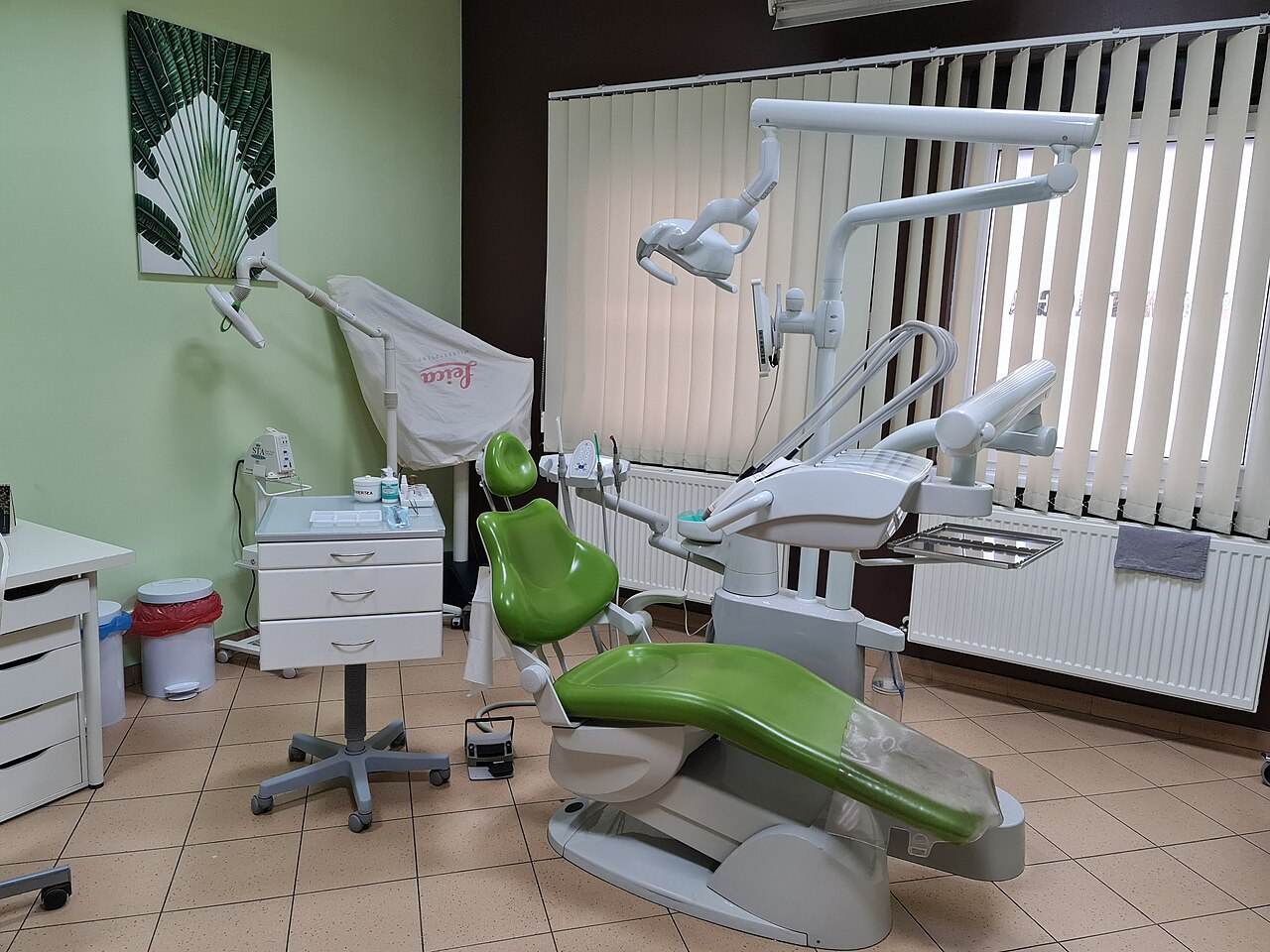 A dental chair and equipment in a dentist office