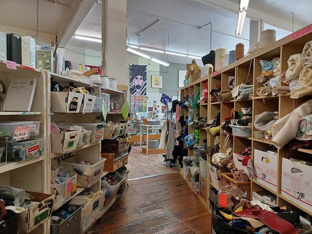 Shelves of secondhand goods in a reuse store