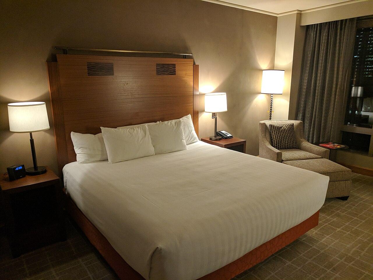 A made bed in a hotel room