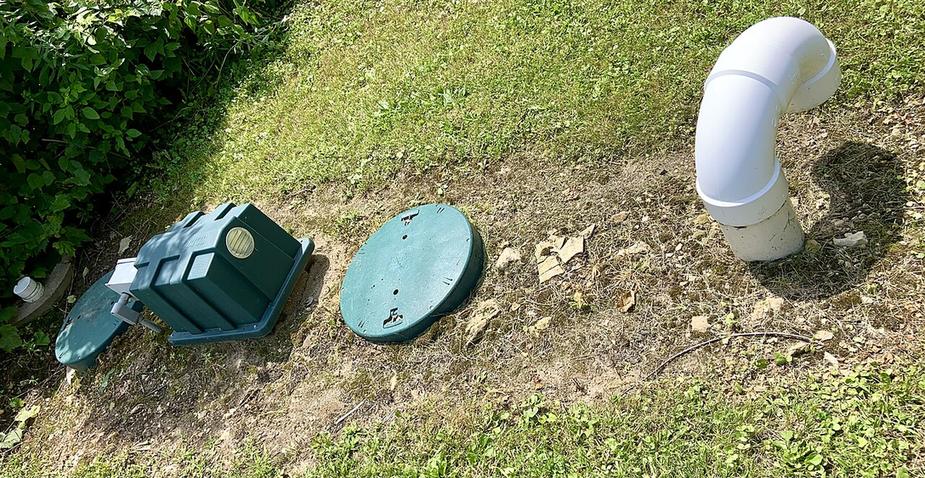 Septic tank access lids set in a lawn