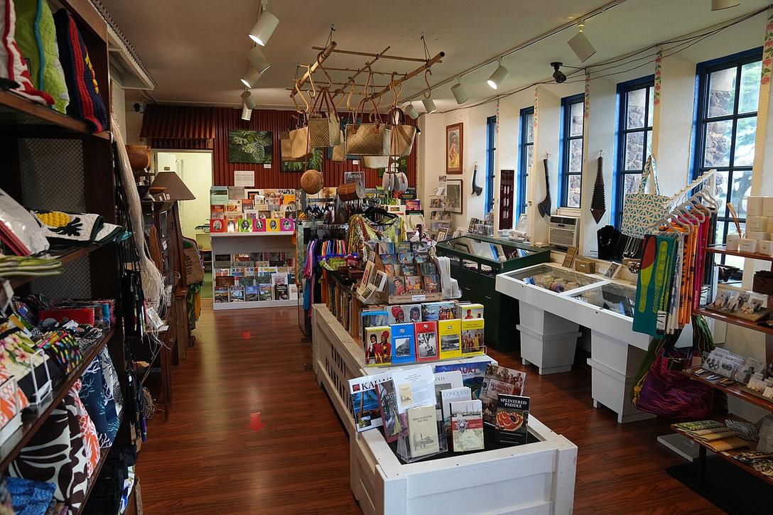 Shelves and tables of goods in a small gift shop