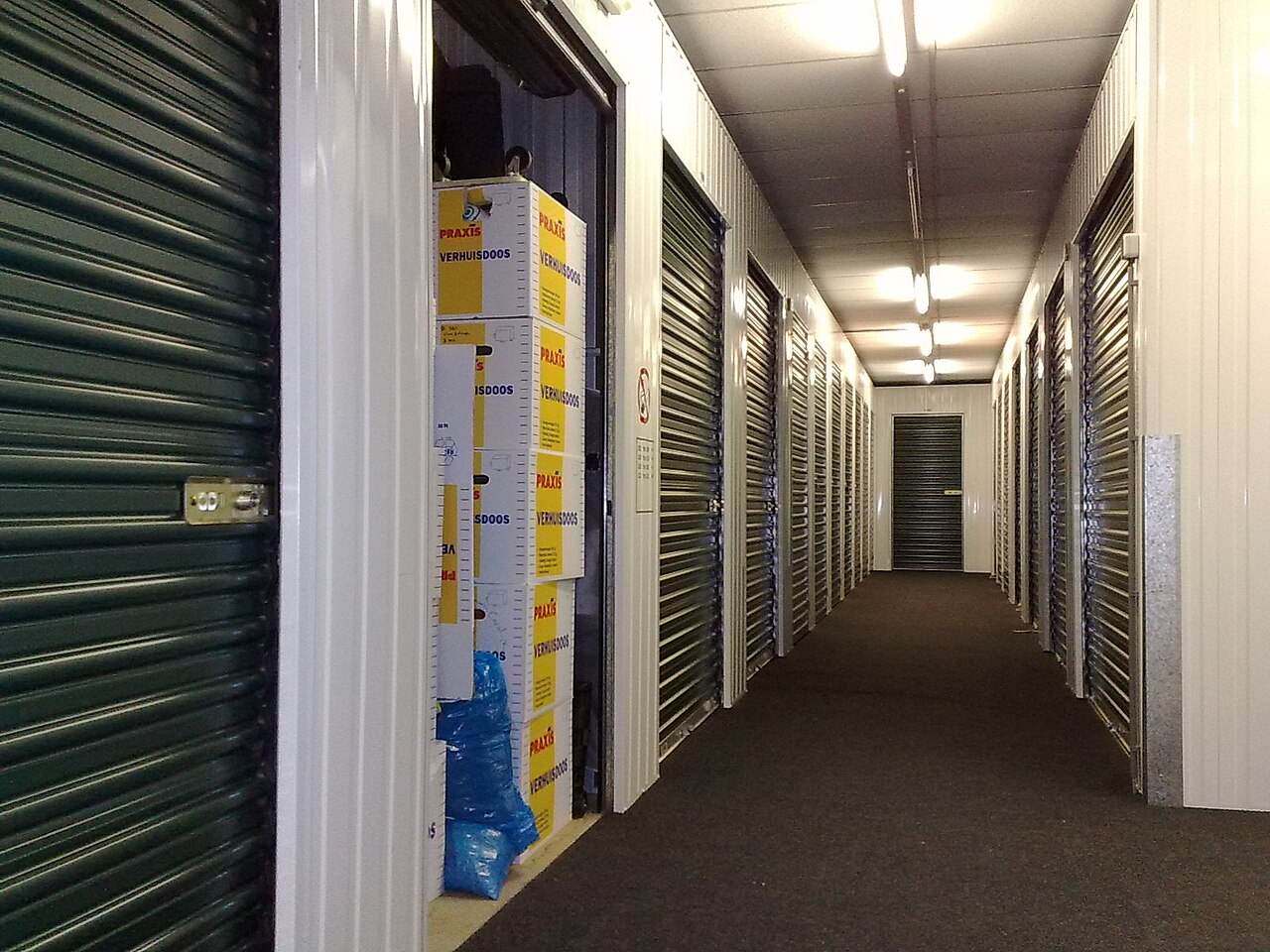 A hallway of indoor self storage units