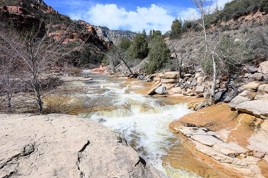 Oak Creek running over red rock ledges