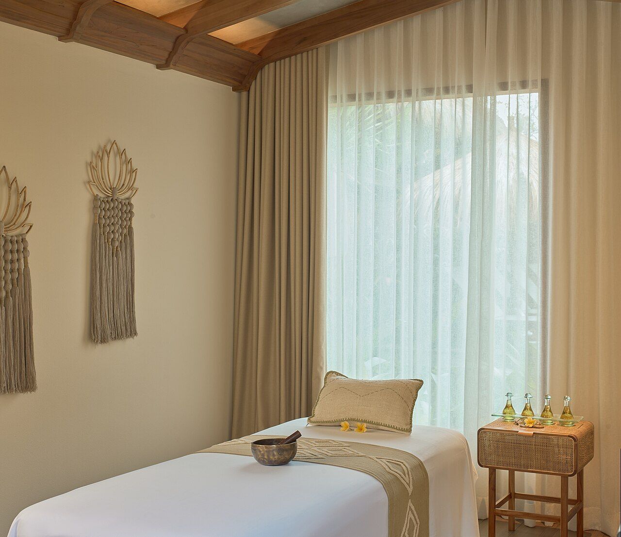 A massage table in a quiet treatment room